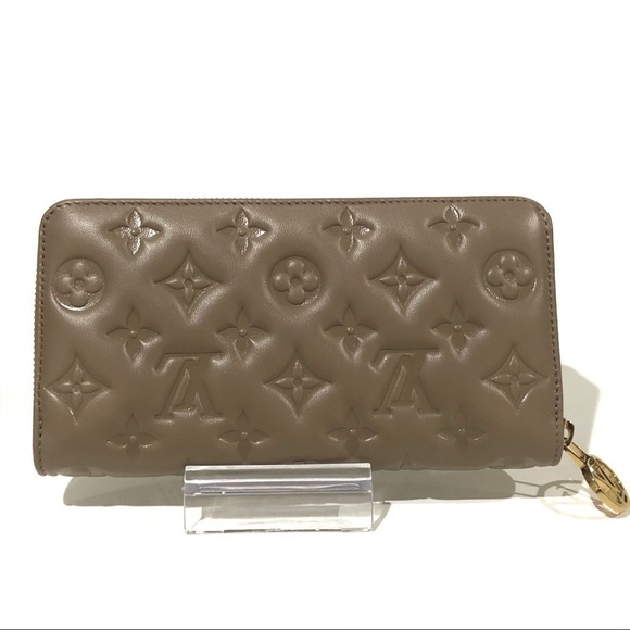 Authentic Louis Vuitton Coussin Monogram Embossed Lambskin Leather Zippy Wallet - Picture 2 of 16